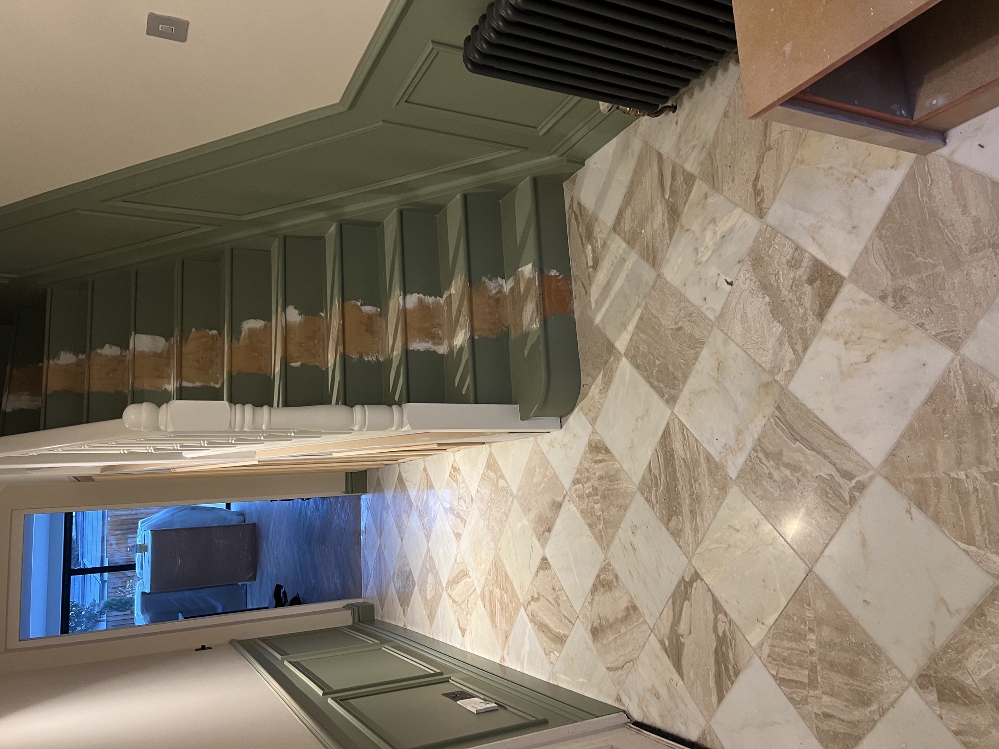 Marble checkerboard tiled hallway floor by MM Contractors London
